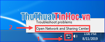 Chọn Open Network and Sharing Center
