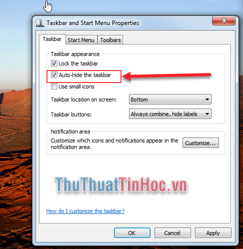 Đánh dấu vào Auto-hide the taskbar và chọn OK